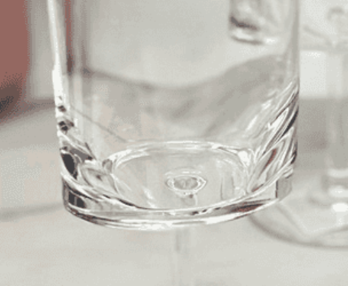 Bottom view of the 12oz plastic wine glass from the Unbreakable Wine Glasses Set, highlighting its clear, durable BPA-free material.