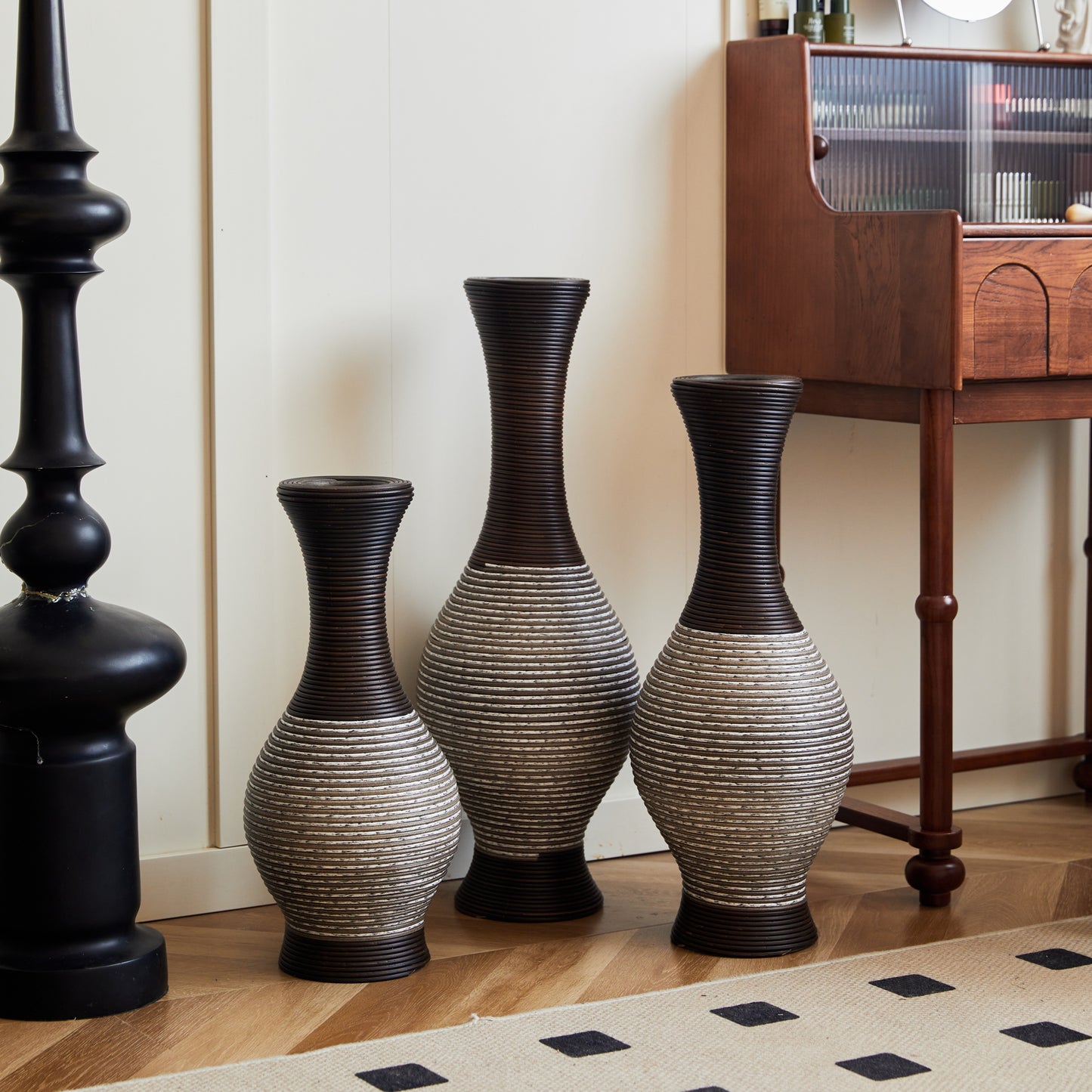 Modern brown floor vase set of 3 with tall, curved design, perfect for home décor, shown near a black lamp and wooden writing desk.