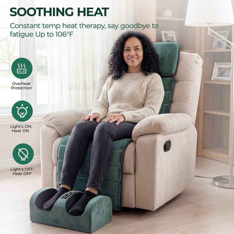 Woman relaxing on a sofa with the massage mat providing soothing heat, with heat protection and heat ON indicators visible.