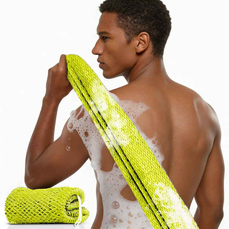Man using a green loofah on a white background