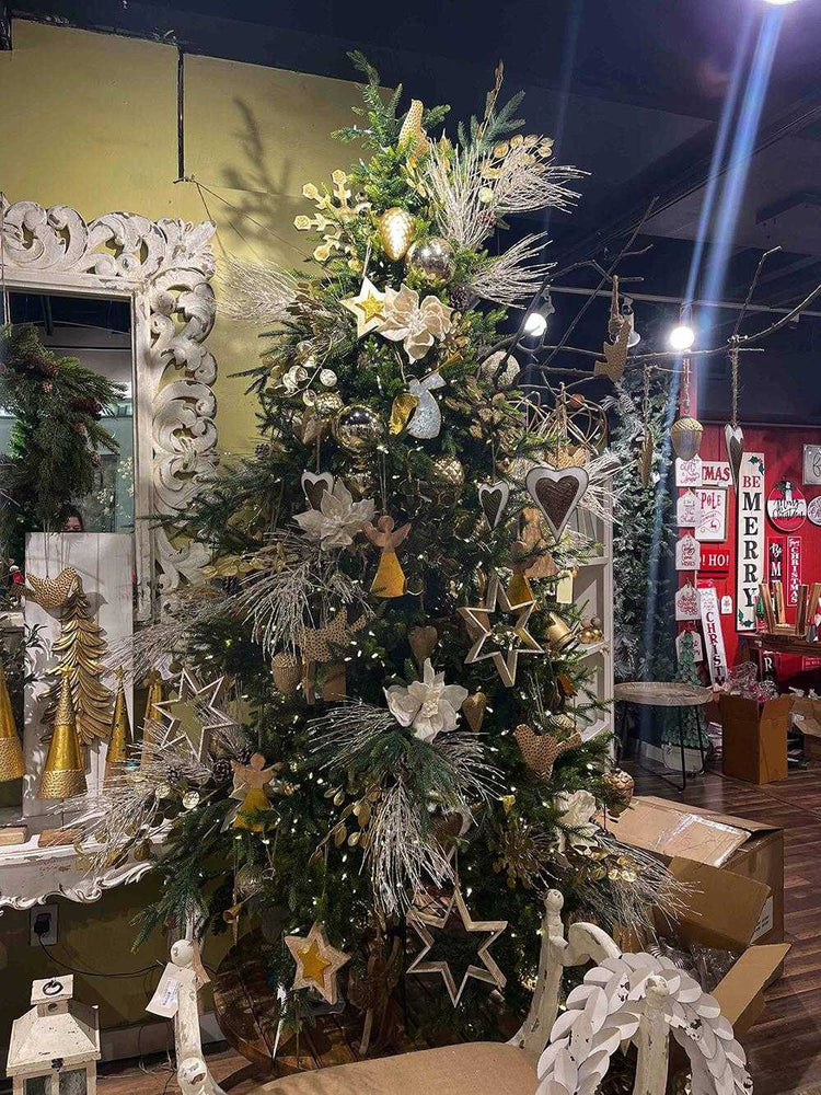 Snowflake hanging ornament on a decorated Christmas tree
