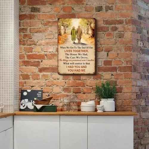 Retro metal wall art for bars and cafes, mounted on a rustic brick wall to complement vintage interior design themes.