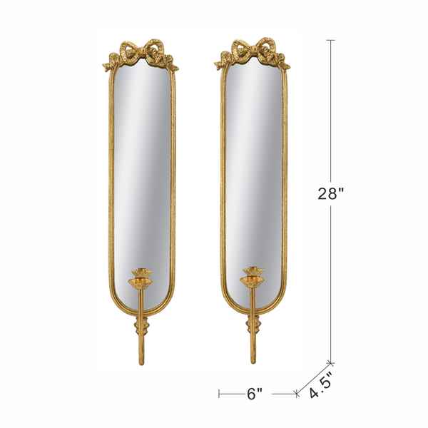 A pair of ornate gold-framed wall mirrors with bow details at the top and candlestick-style holders at the bottom, shown on a white background with dimension lines indicating 28 inches tall, 6 inches wide, and 4.5 inches deep.