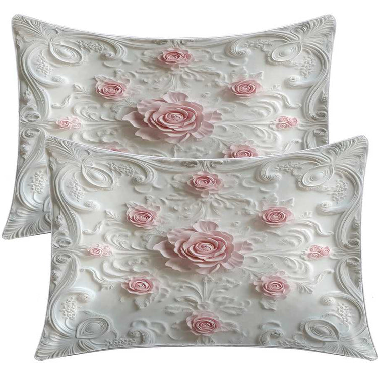 Two decorative pillows with floral patterns on a white background