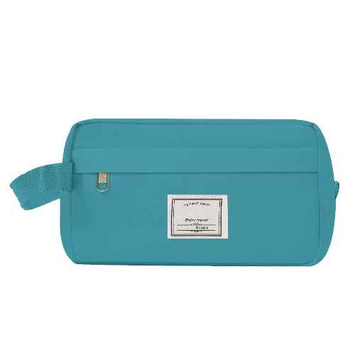 Teal toiletry bag with a label on a white background