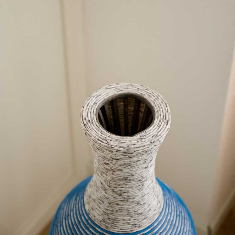 Top view of 39-inch floor vase decor showcasing its narrow opening and detailed PVC craftsmanship. Great for dried floral arrangements.