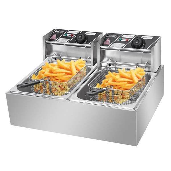 Double tank electric deep fryer with baskets of french fries in stainless steel kitchen equipment