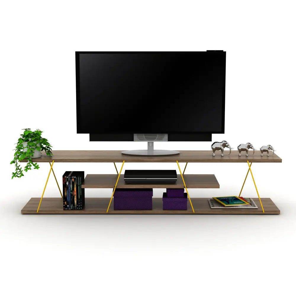 Modern wood TV stand with yellow metal legs, flat-screen TV, decor, books, and plants