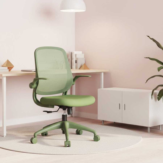 Green office chair in a modern office setting with a desk and cabinet.