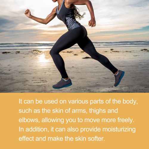 A woman running on a sandy beach at sunset wearing a dark gray and black athletic tank top and leggings. A text overlay at the bottom explains the benefits of the product, which appears to be a body moisturizer or skin care treatment.