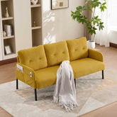 Yellow sofa with a white blanket in a living room setting