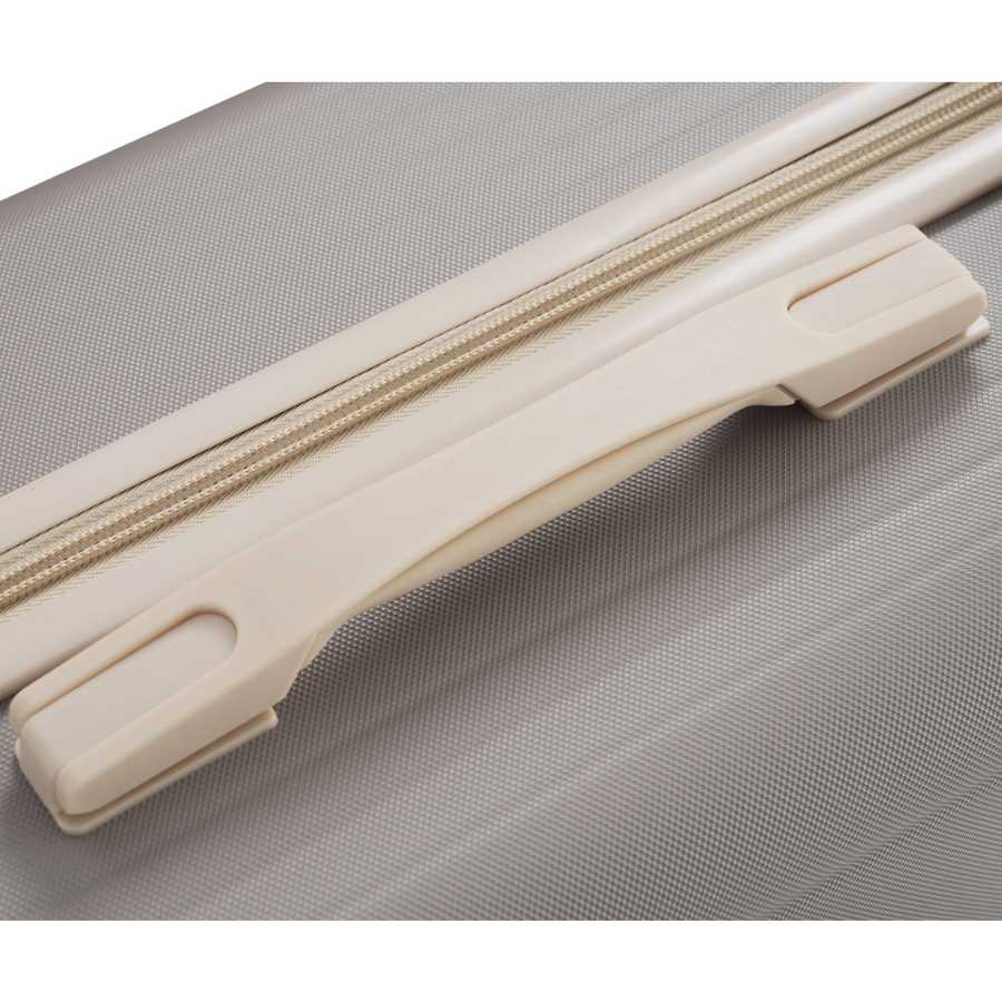 Reinforced carry handle on durable lightweight suitcase ensures easy lifting and added durability for frequent travelers.