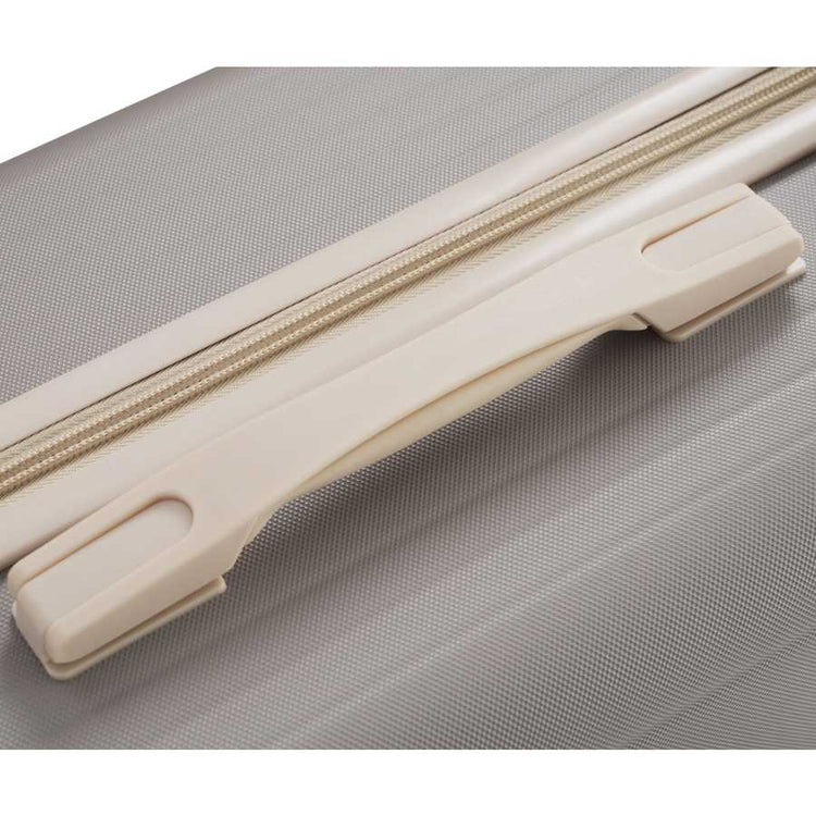 Reinforced carry handle on durable lightweight suitcase ensures easy lifting and added durability for frequent travelers.