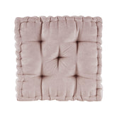 Square cushion with tufted texture on a white background