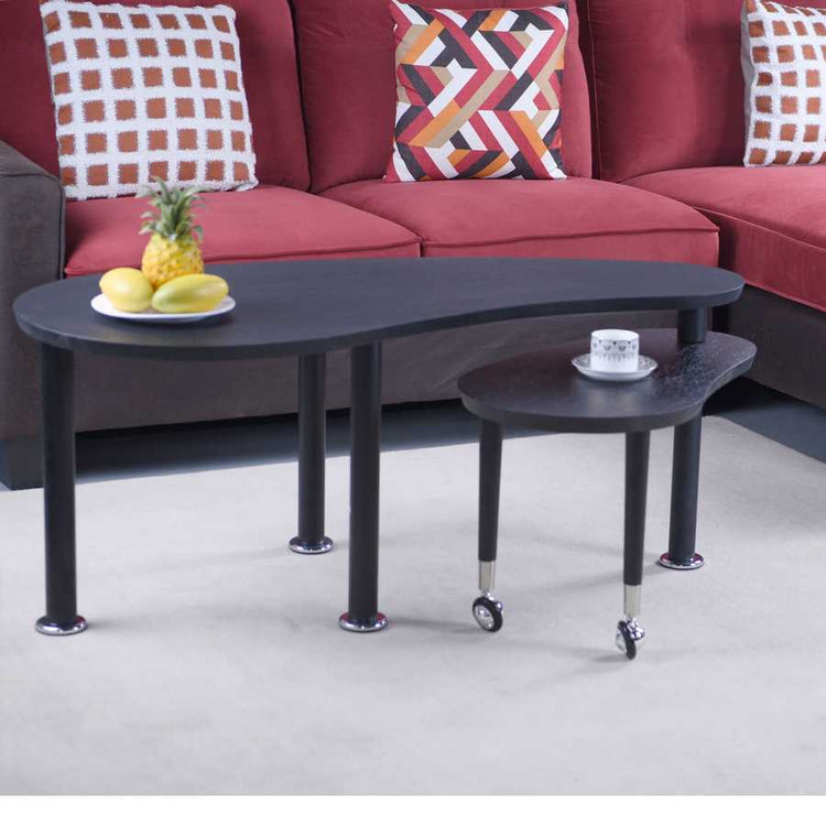 360 Rotatable Coffee Table in black wood with fruit and tea set, offering a stylish and space-saving solution for modern interiors.