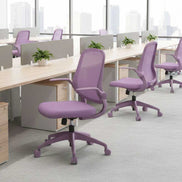 Purple office chairs in a modern office setting with large windows.