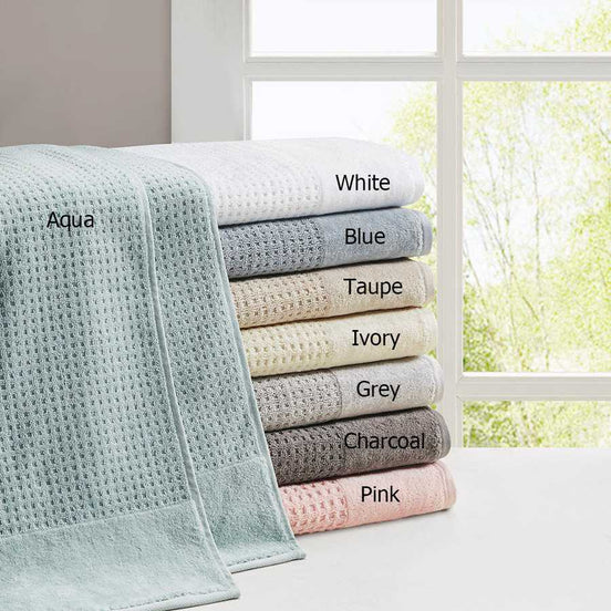 Color options for antimicrobial cotton waffle bath towel set shown in aqua, white, blue, taupe, ivory, grey, charcoal, and pink.