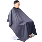 Durable Salon Styling Chair for Hair Professionals shown in use, highlighting adjustable height and stainless steel base.