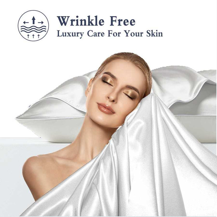 Woman lying on a white satin sheet with &