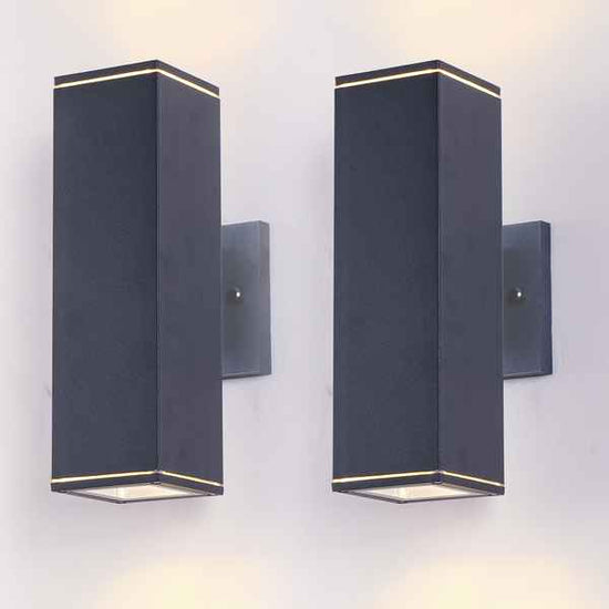 Two black square wall lights on a white background