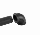 Black industrial pipe fitting with threaded interior, durable metal construction, used for plumbing or industrial applications