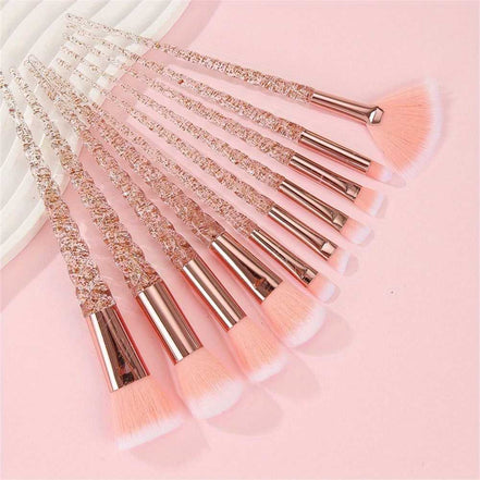 Elegant Pink Crystal Makeup Brushes with spiral glitter handles and soft pink tips ideal for contouring, blending, and highlighting.