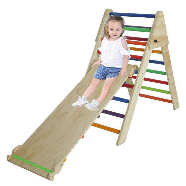 Child on a colorful wooden slide and climbing structure