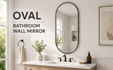 Bathroom with oval wall mirror, sink, and decor elements.