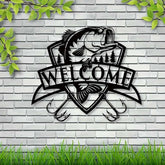 Black fish wall decor with trees and &