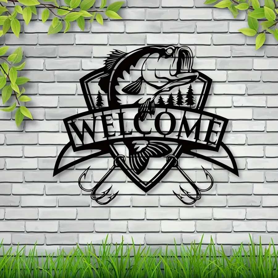 Black fish wall decor with trees and 'Welcome' banner on white siding