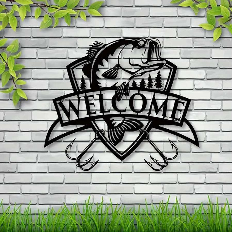 Black fish wall decor with trees and &