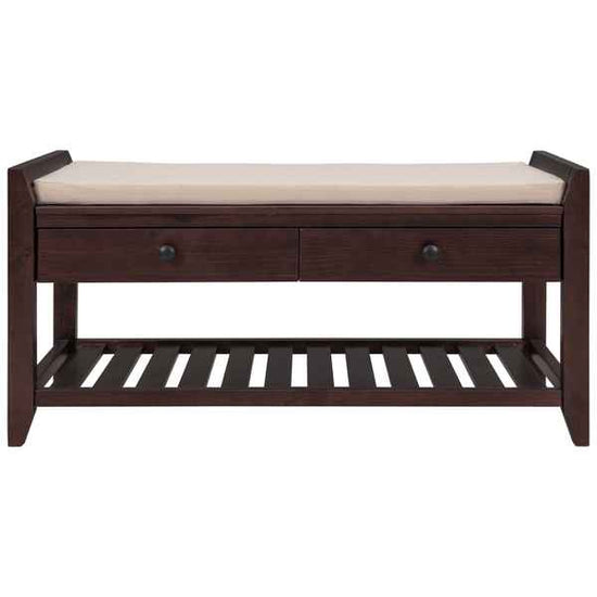 A dark brown wooden bench with a beige cushioned seat, featuring two drawers with round dark knobs and a slatted lower shelf, shown against a plain white background.