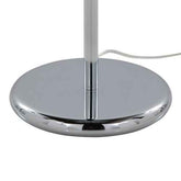 Close-up of a polished chrome lamp base and central pole on a white background, with a white cord visible.