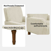 Beige armchair with nailhead trim and wooden legs, labeled features.