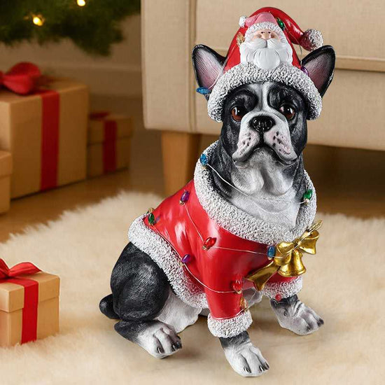 Christmas French Bulldog statue in red Santa outfit, close-up