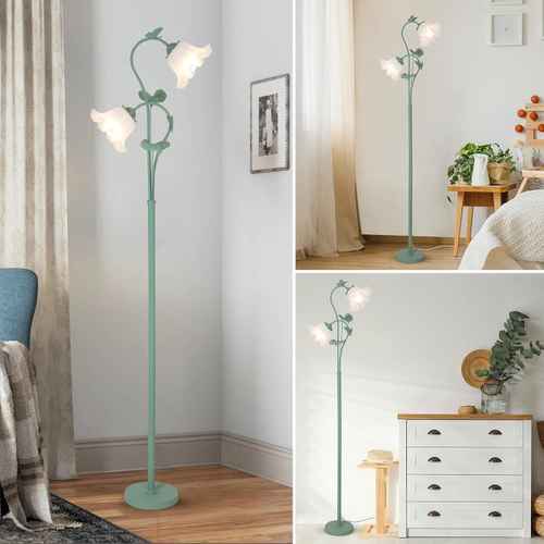 Decorative floor lamp with multiple light bulbs in a home setting