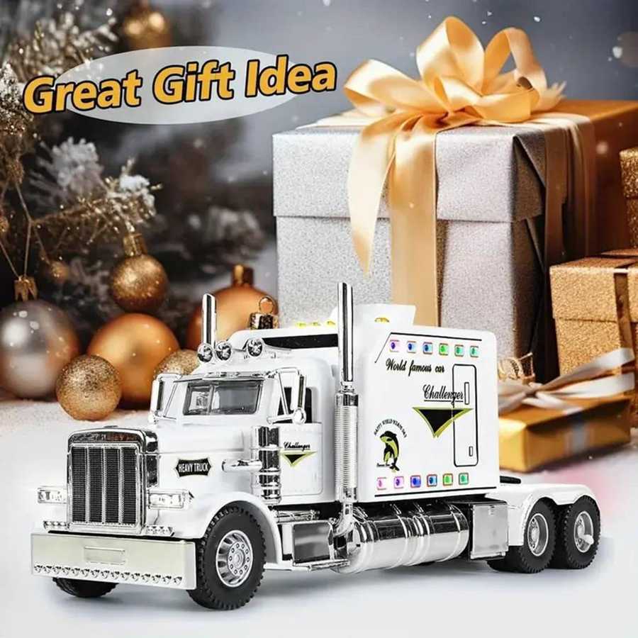 Model truck with a large gift box and Christmas decorations in the background