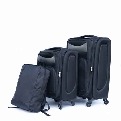 Set of black suitcases and backpack on a white background