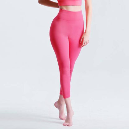Seamless Tummy Control Yoga Pants in pink featuring high waisted design for women’s activewear. Ideal for workouts and everyday comfort.