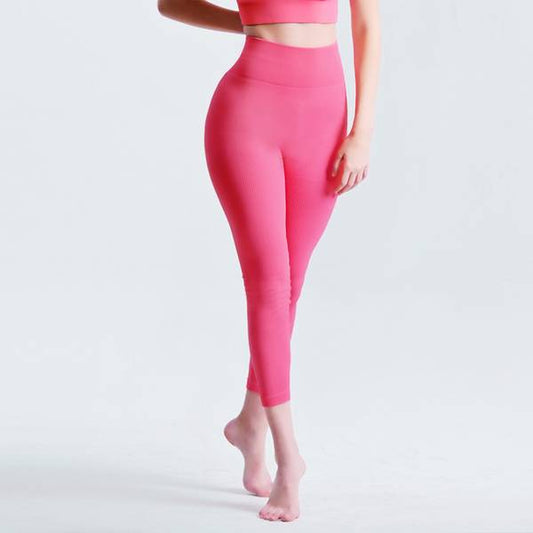 Seamless Tummy Control Yoga Pants in pink featuring high waisted design for women’s activewear. Ideal for workouts and everyday comfort.