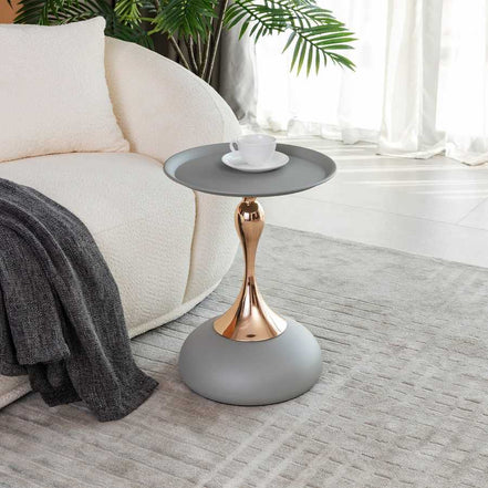 Compact and stylish Mermaid Tail Coffee Table with minimalist design, featuring a gold base and grey top, ideal for modern interiors.