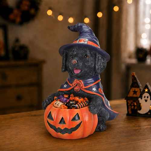 Halloween black Labrador Retriever figurine dressed as a witch with a purple hat and cape, holding a pumpkin-shaped candy bowl, 12.6 inches resin decoration