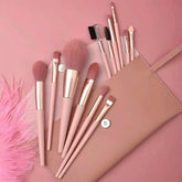 Beginner makeup brush set with pink pouch, featuring powder, eyeshadow, and brow brushes for a complete cosmetic tool kit.