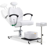 White hair salon chair with headrest and footrest on a white background