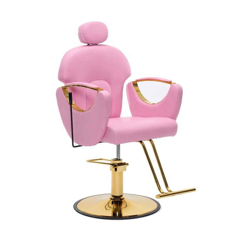A pink salon barber chair with gold metal accents, featuring a high back, headrest, armrests with integrated mirrors, and a circular hydraulic base on a white background.