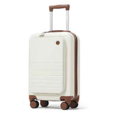 A cream-colored hard-shell spinner suitcase with brown accents on the handle, trim, and wheel centers, shown on a clean white background.