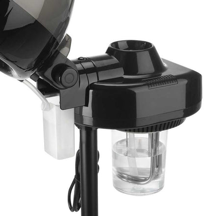 Close-up of black hair steamer with adjustable height and water tank