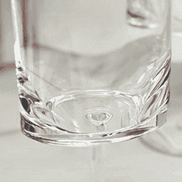 Bottom view of the 12oz plastic wine glass from the Unbreakable Wine Glasses Set, highlighting its clear, durable BPA-free material.