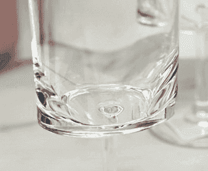 Bottom view of the 12oz plastic wine glass from the Unbreakable Wine Glasses Set, highlighting its clear, durable BPA-free material.