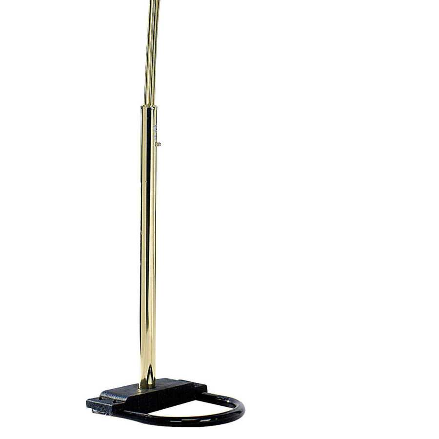 Gold and black floor lamp on a white background